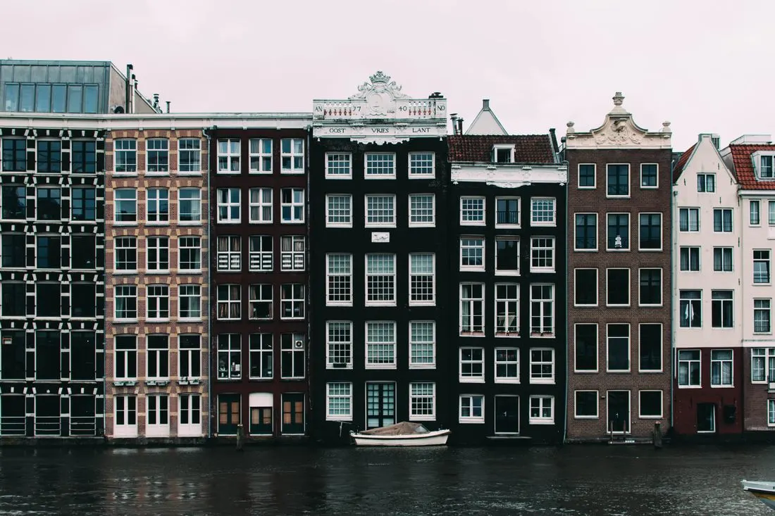 Traditional Amsterdam houses beside a canal