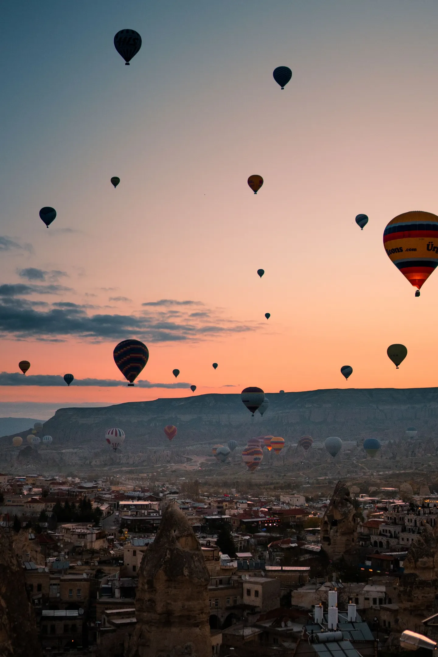 Hot-air balloons above the rock formations of Cappadocia