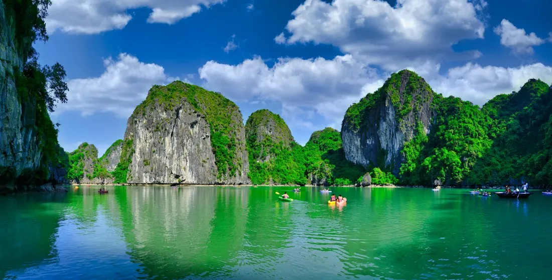 Limestone islands and green water in Ha Long Bay